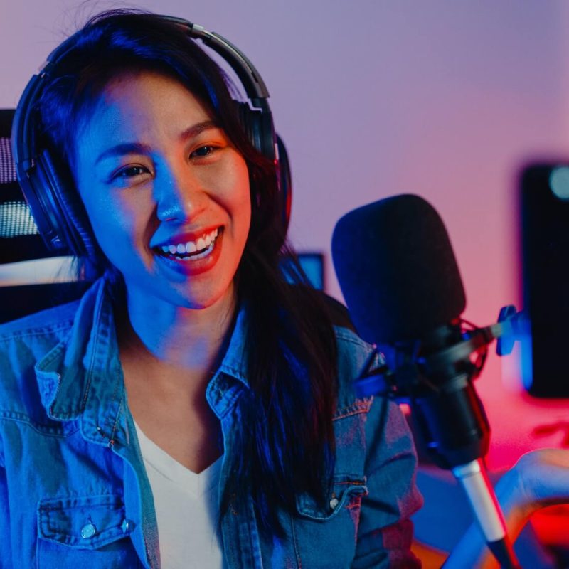 asia-girl-blogger-music-influencer-use-smartphone-broadcast-recording-wear-headphone-online-1-1.jpg