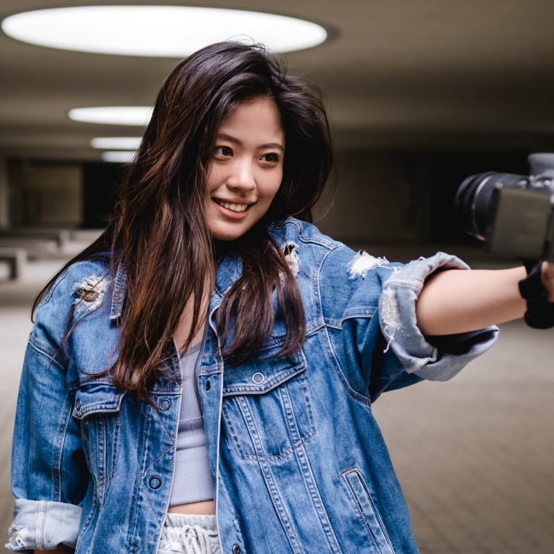 asian-woman-vlogging-and-using-camera-social-media-influencer-content-creator-lifestyle-1.jpg